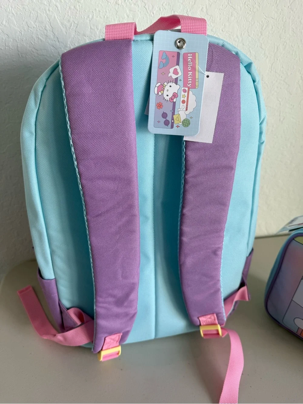 New girls Hello Kitty Pastel Blue, Purple & Pink Backpack with Matching Lunchbox